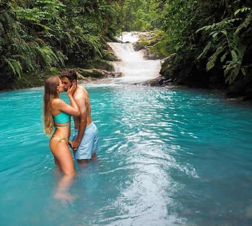 Blue Falls of Costa Rica - Kissing couple.